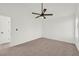 Bright bedroom with ceiling fan and plush carpeting at 2535 Hallie Mill Rd, Atlanta, GA 30349