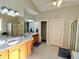 Spacious bathroom with double sinks, soaking tub, and shower at 9801 Waters Edge Pointe, Villa Rica, GA 30180