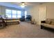 Spacious bedroom with large windows and sitting area at 9801 Waters Edge Pointe, Villa Rica, GA 30180