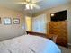 Spacious bedroom with a TV and built-in dresser at 9801 Waters Edge Pointe, Villa Rica, GA 30180