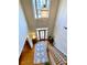 Bright entryway with hardwood floors and staircase at 9801 Waters Edge Pointe, Villa Rica, GA 30180