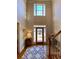Bright and spacious two story entryway with hardwood floors and staircase at 9801 Waters Edge Pointe, Villa Rica, GA 30180