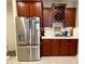 Stainless steel appliances and granite countertops highlight this spacious kitchen at 9801 Waters Edge Pointe, Villa Rica, GA 30180