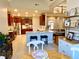 Open concept kitchen with breakfast nook and view to living area at 9801 Waters Edge Pointe, Villa Rica, GA 30180