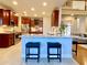 Open concept kitchen with granite countertops and island at 9801 Waters Edge Pointe, Villa Rica, GA 30180