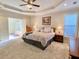 Spacious main bedroom with en-suite bathroom and ample natural light at 9801 Waters Edge Pointe, Villa Rica, GA 30180