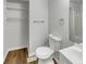 Clean bathroom with new toilet and vanity, plus shelving at 2845 Robinson Wood Dr, Riverdale, GA 30296