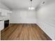 Spacious dining area with wood-look flooring and a door to exterior at 2845 Robinson Wood Dr, Riverdale, GA 30296