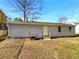 Simple house exterior with small yard and new wooden steps at 2845 Robinson Wood Dr, Riverdale, GA 30296