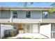 Back exterior of townhouse with patio, white fence, and storage area at 2858 Vining Ridge Ter, Decatur, GA 30034
