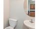 Small half bathroom with sink and toilet at 2858 Vining Ridge Ter, Decatur, GA 30034