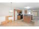 Kitchen with wood cabinets, black appliances, and an island at 2858 Vining Ridge Ter, Decatur, GA 30034