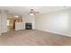 Spacious living room with a fireplace and neutral carpeting at 2858 Vining Ridge Ter, Decatur, GA 30034