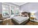 Charming bedroom with hardwood floors, neutral walls and access to a private deck at 3405 Roswell Ne Rd, Atlanta, GA 30305