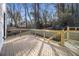 Wooden deck with stairs, offering a private outdoor space at 608 S Evelyn Nw Pl, Atlanta, GA 30318