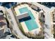 Aerial view of community tennis courts with covered seating at 360 Chambers St # 204, Woodstock, GA 30188