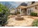 Brick home features backyard with stone patio and outdoor fire pit at 1060 Morley Se Ave, Atlanta, GA 30312