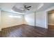 Finished basement area with a tray ceiling, recessed lights, and wood-look floors at 1060 Morley Se Ave, Atlanta, GA 30312