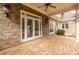 Covered patio boasts brick flooring and glass doors leading inside at 1060 Morley Se Ave, Atlanta, GA 30312