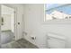 Unfinished bathroom with toilet and plumbing at 1111 Park Nw Cir, Conyers, GA 30012