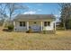 Cute bungalow with front porch and large yard at 1111 Park Nw Cir, Conyers, GA 30012