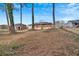 Large backyard with mature trees and a shed at 4223 Welbron Dr, Decatur, GA 30035