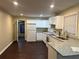 Modern kitchen with white cabinets, granite countertops, and stainless steel appliances at 4223 Welbron Dr, Decatur, GA 30035