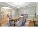 Elegant dining room with hardwood floors and a chandelier at 7400 Bronson Way, Cumming, GA 30041