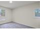 Bright bedroom with gray carpet and large window at 3308 Wildwood Sw Dr, Marietta, GA 30060