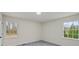 Bright, minimalist bedroom with neutral walls and large windows allowing ample light at 3308 Wildwood Sw Dr, Marietta, GA 30060
