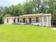 Charming renovated home with a welcoming front porch and freshly painted white exterior at 3308 Wildwood Sw Dr, Marietta, GA 30060