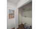 Laundry room area with back door and laundry sign at 3308 Wildwood Sw Dr, Marietta, GA 30060