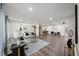 Spacious open-concept living area with modern furnishings and hardwood floors throughout at 3308 Wildwood Sw Dr, Marietta, GA 30060