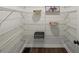 Walk-in pantry offering ample storage with metal shelving and wooden floors at 3308 Wildwood Sw Dr, Marietta, GA 30060
