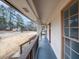 Inviting covered porch with views of the neighborhood and classic railings at 3308 Wildwood Sw Dr, Marietta, GA 30060