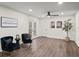Cozy sitting area with French doors and modern accents, ideal for relaxing and enjoying natural light at 3308 Wildwood Sw Dr, Marietta, GA 30060