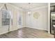 Bright dining area with hardwood floors and chandelier at 6233 Thorncrest Dr, Tucker, GA 30084