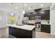 Modern kitchen with stainless steel appliances and large island at 6233 Thorncrest Dr, Tucker, GA 30084