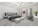 Spacious main bedroom with carpeted floor, ceiling fan and sitting area at 6233 Thorncrest Dr, Tucker, GA 30084