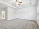 Main bedroom with wall paneling and carpet flooring at 6233 Thorncrest Dr, Tucker, GA 30084