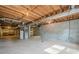 Unfinished basement offering ample storage space at 118 Knotts Landing Dr, Woodstock, GA 30188