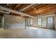 Unfinished basement area with multiple windows at 118 Knotts Landing Dr, Woodstock, GA 30188
