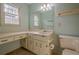 Updated bathroom with vanity, sink, and toilet at 118 Knotts Landing Dr, Woodstock, GA 30188