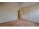Spacious bedroom with ceiling fan and access to closets and bathroom at 118 Knotts Landing Dr, Woodstock, GA 30188