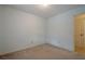 Empty bedroom featuring light blue walls and carpeted floors at 118 Knotts Landing Dr, Woodstock, GA 30188