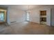 Spacious dining room features carpeting, chandelier, and access to kitchen at 118 Knotts Landing Dr, Woodstock, GA 30188