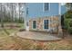 Rear view of house showcasing stone and siding at 118 Knotts Landing Dr, Woodstock, GA 30188