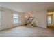 Living room with a view of the front door and staircase at 118 Knotts Landing Dr, Woodstock, GA 30188