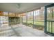 Spacious screened porch overlooking a large backyard at 118 Knotts Landing Dr, Woodstock, GA 30188