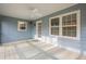 Screened porch with ceiling fan and access to backyard at 118 Knotts Landing Dr, Woodstock, GA 30188